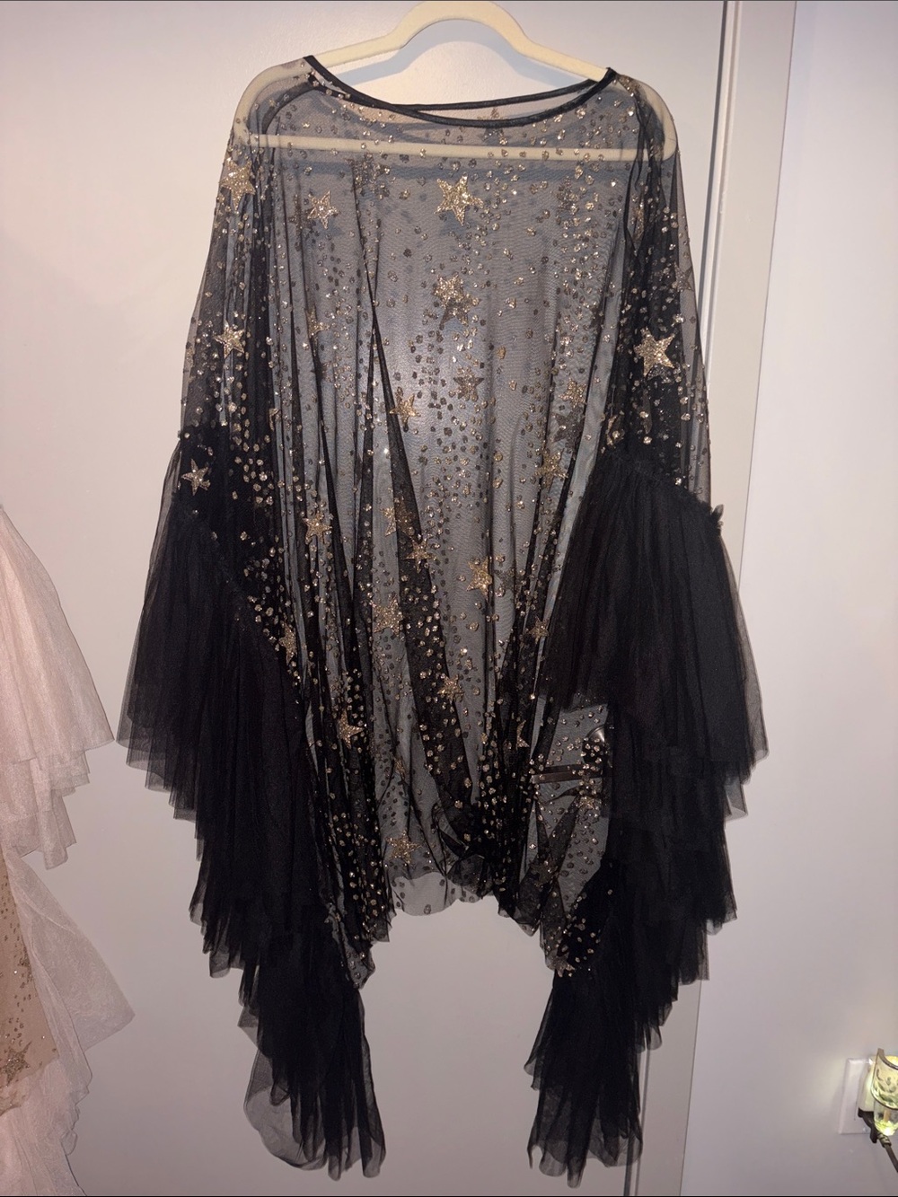 Star-Embellished Sheer Capelet in Black and Gold